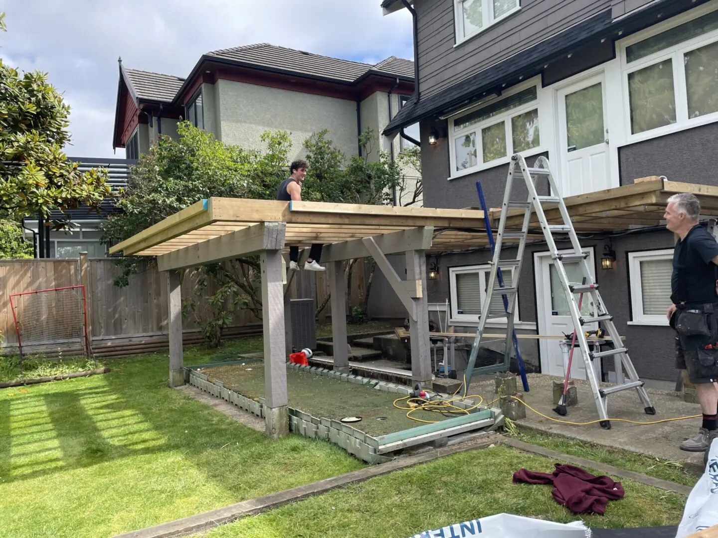 two men working on a deck