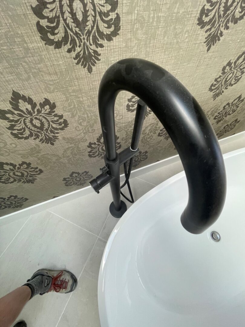 tub faucet scaled